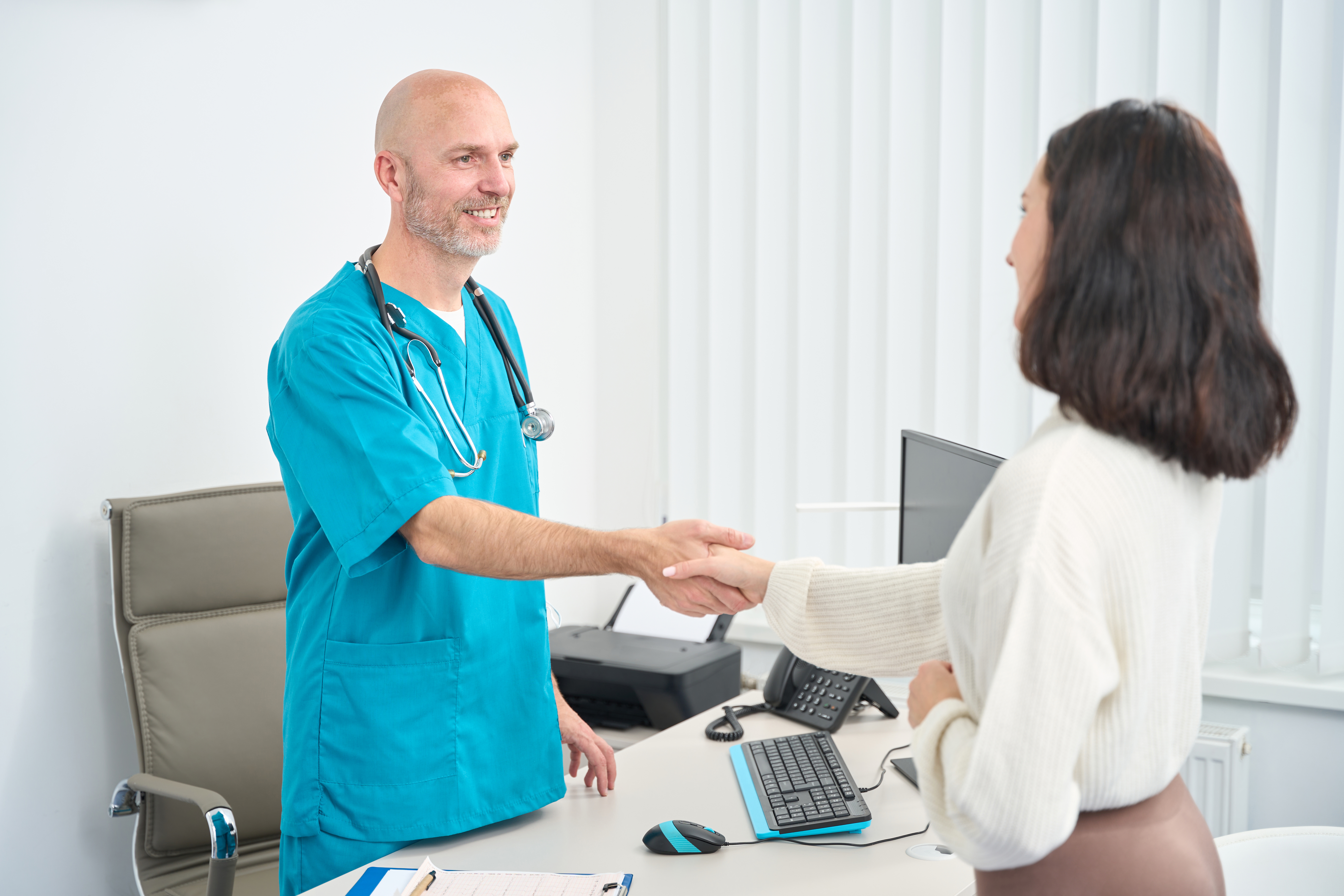 patient-shakes-hands-with-the-doctor-while-in-the-2025-03-08-04-43-44-utc