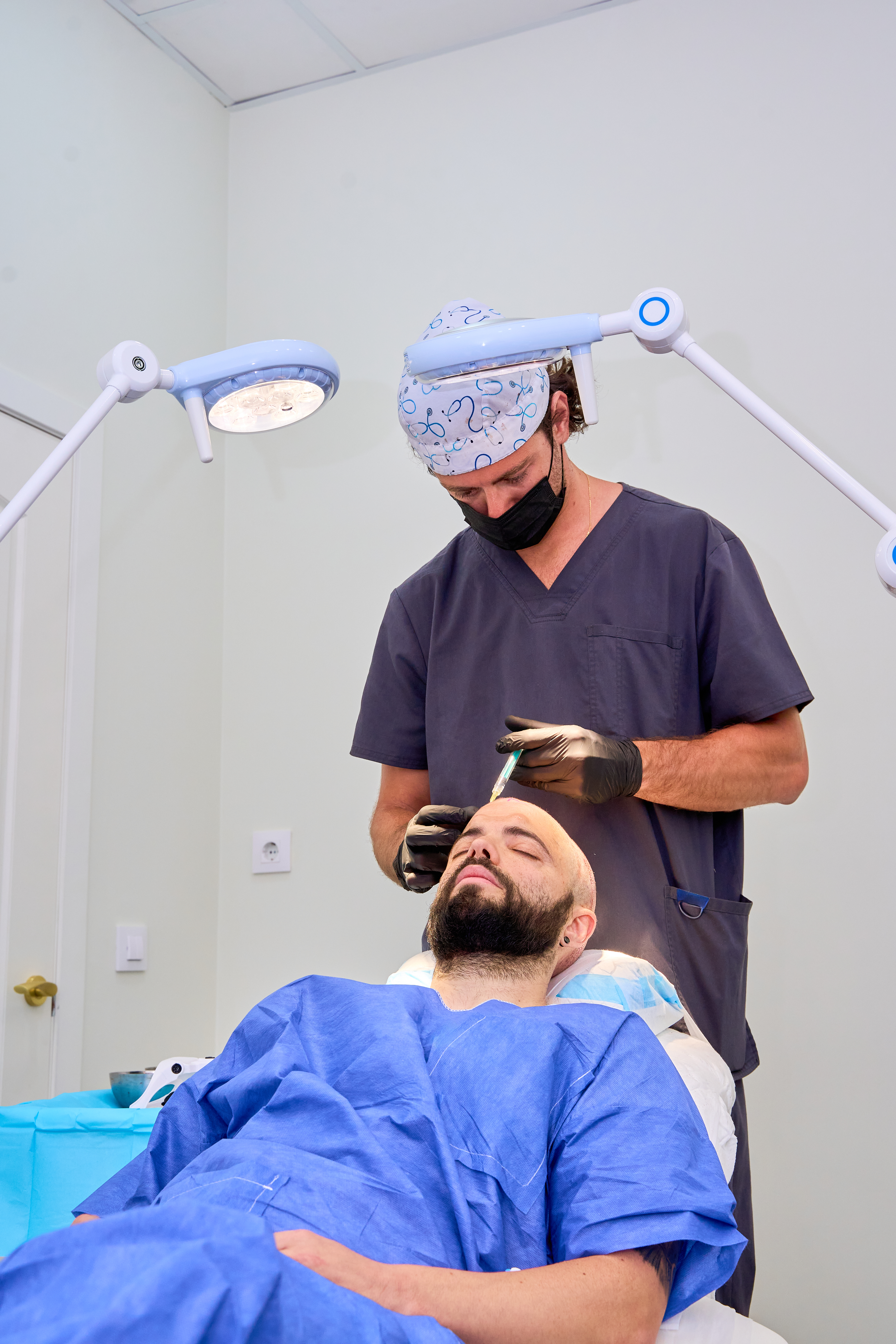 doctor-administering-scalp-injection-during-a-hair-2025-05-25-20-40-20-utc