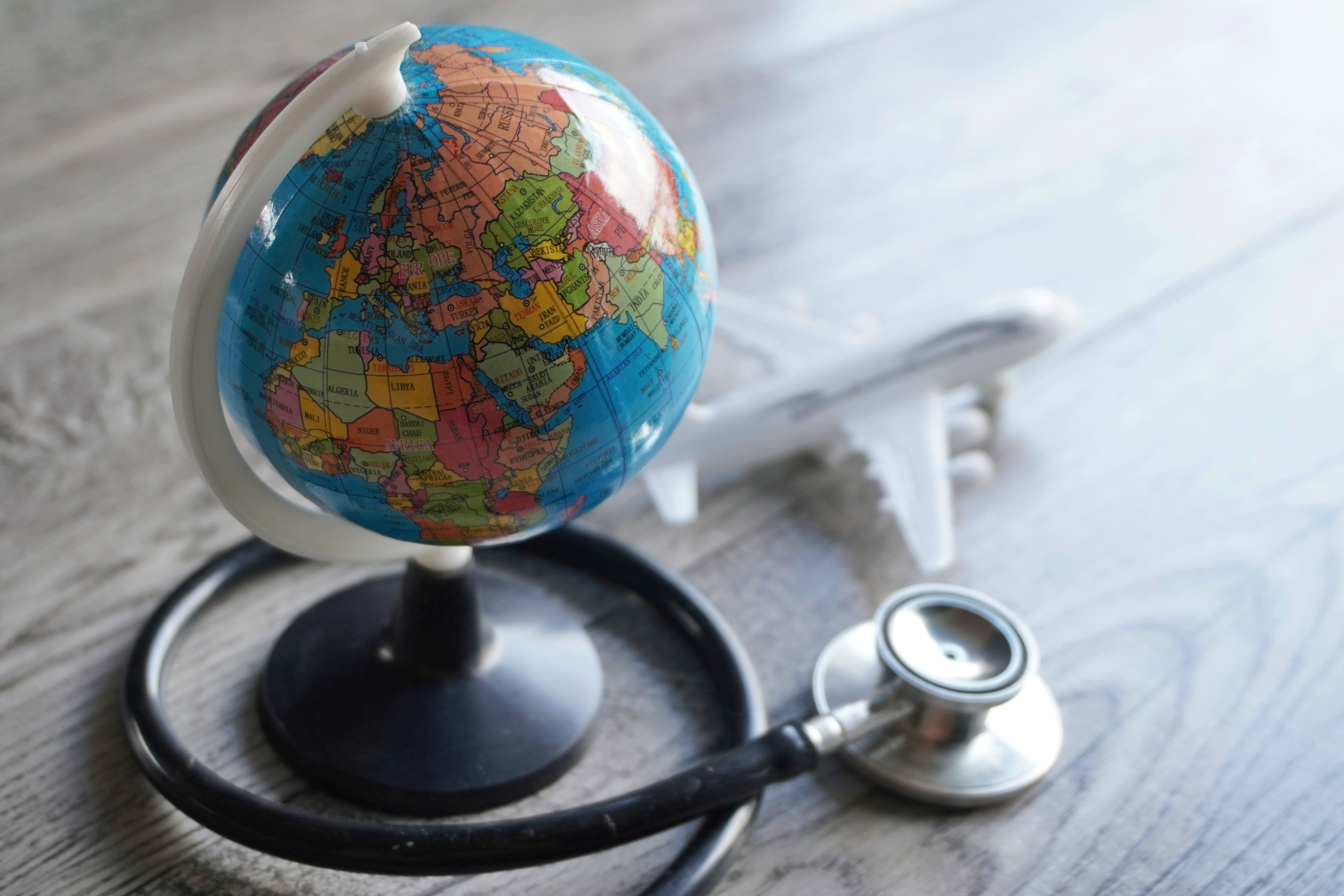 selective-focus-image-of-globe-toy-plane-and-stet-2025-03-16-15-54-40-utc (1)